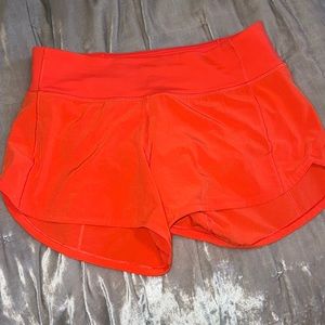 Orange lululemon shorts